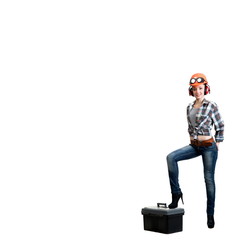 Girl in a construction helmet, noise-insulating headphones with a tool box
