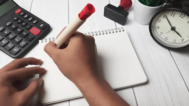 A young man writen Furloughed. 4k Resolution