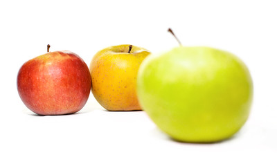 Red yellow and green apple on a white background