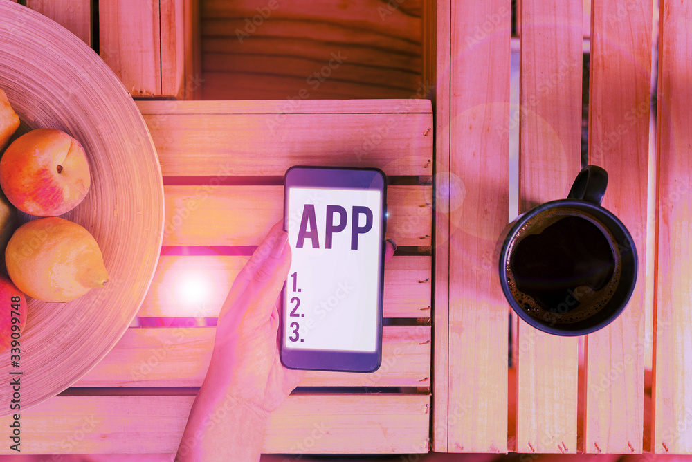 Poster text sign showing app. business photo showcasing computer program download software by a user to a m