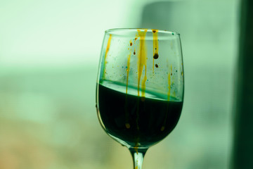 wine glass with watercolors  paints 