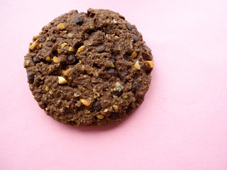 chocolate chip cookies on pink background