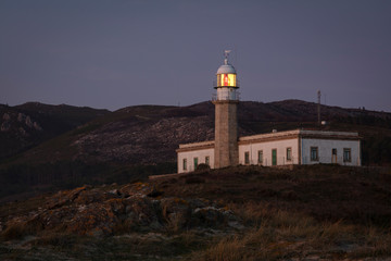 Fototapeta na wymiar Lariño lighthouse at night