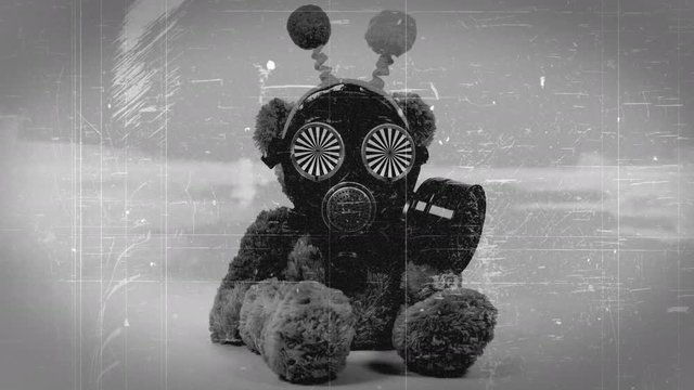 Teddy bear wearing gas mask with hypnotic eyes