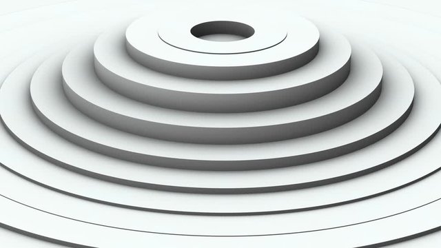 上下に膨張と収縮をするシンプルな同心円