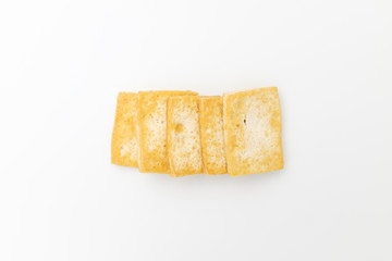 Grilled tofu on white background