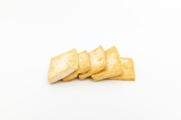 Grilled tofu on white background