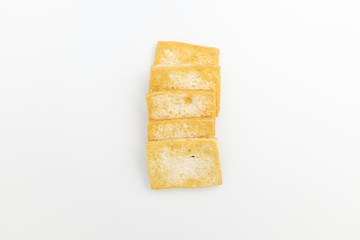 Grilled tofu on white background