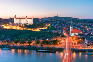Fototapeta na wymiar Bratislava castle over Danube river after sunset in the Bratislava old town, Slovakia