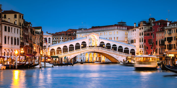 Rialto bridge on the Grand Canal at night, Venice, Italy - Powered by Adobe