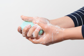 Fototapeta premium Hygiene to protect human health from viruses, hand washing with soap process.