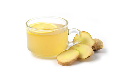 Fresh ginger juice in a glass cup on a healthy white background
