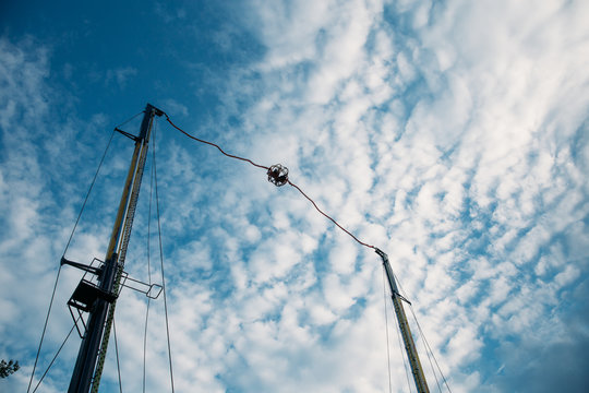 People Having Fun On A Reversed Bungee, Also Called Slingshot Ride.