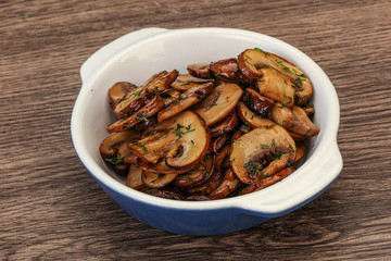 Roasted champignon with herbs and spices