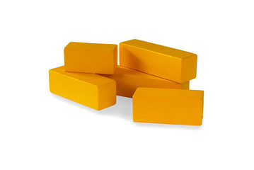 A stack of yellow rectangular block isolated on a white background.Montessori children educational toys.