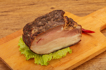 Homemade Smoked pork peat with spices