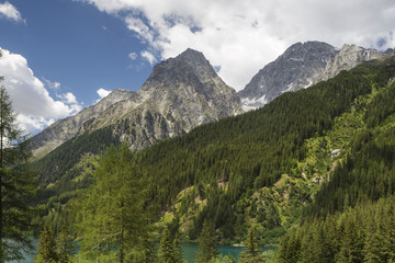 Fototapeta na wymiar The rugged montains of the Dolomite around Lago di Anterselva, Italy.