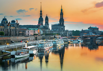 Fototapeta premium Dresden city skyline at Elbe river and Augustus bridge at sunset, Dresden, Saxony, Germany