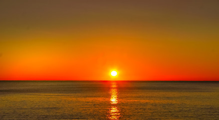 Fototapeta na wymiar The ocean with a sunset