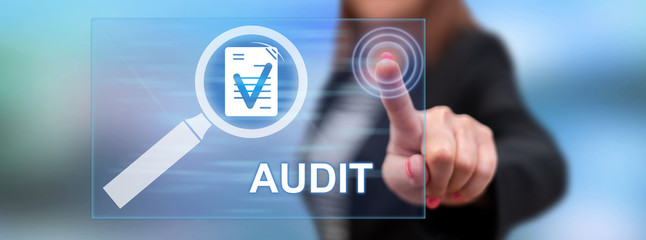 Woman touching an audit concept