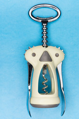 corkscrew on blue background