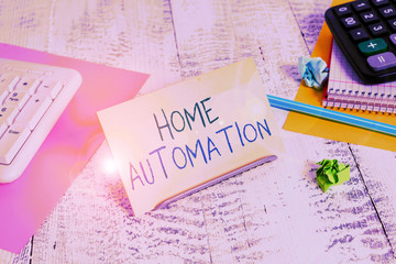Conceptual hand writing showing Home Automation. Concept meaning home solution that enables...