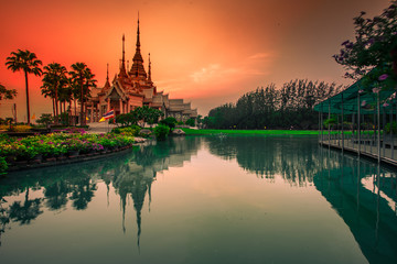 Wallpaper Wat Lan Boon Mahawihan Somdet Phra Buddhacharn(Wat Non Kum)is the beauty of the church that reflects the surface of the water,popular tourists come to make merit and take a public photo