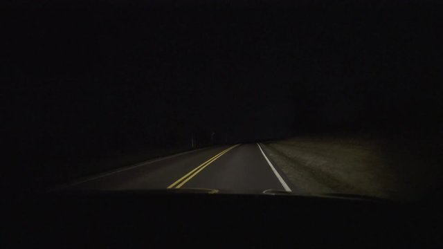 Passenger POV On Empty Country Road At Night