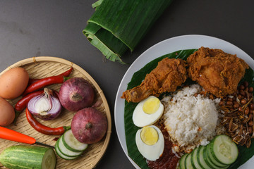 Nasi Lemak-Malaysian cuisine. A fragrant rice dish cooked in coconut milk and pandan leaf commonly...