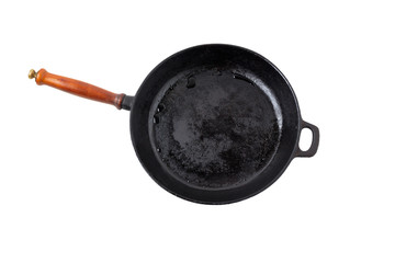 black cast-iron frying pan with wooden handle