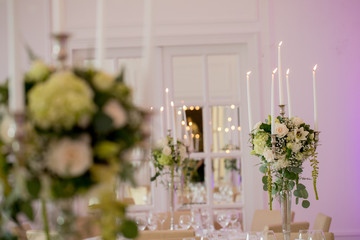 Beautiful Flowers and candles in restaurant