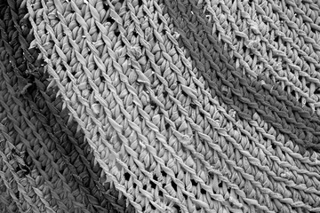 Handmade carpet made of old rugs in black and white.