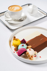gourmet dessert with macaroons and chocolate
