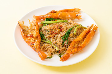 Stir-fried rice vermicelli and water mimosa with river prawns