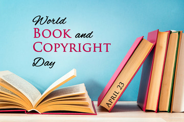 World book and copyright day, april 23. Poster with stack of books.