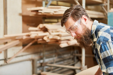 Carpenter with safety glasses