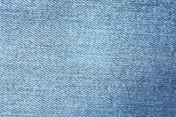 Abstract fabric texture of blue jeans or denim background.