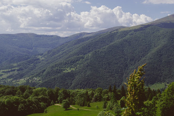 beautiful view of the forest, mountains and clouds with a tonal perspective in summer	
