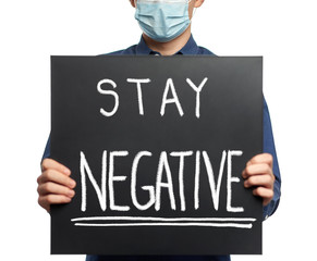 Man with Stay Negative sign
