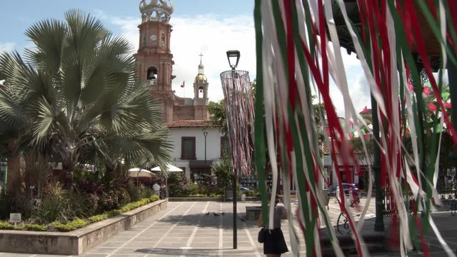 Woman visiting the center of Puerto Vallarta on a sunny day.