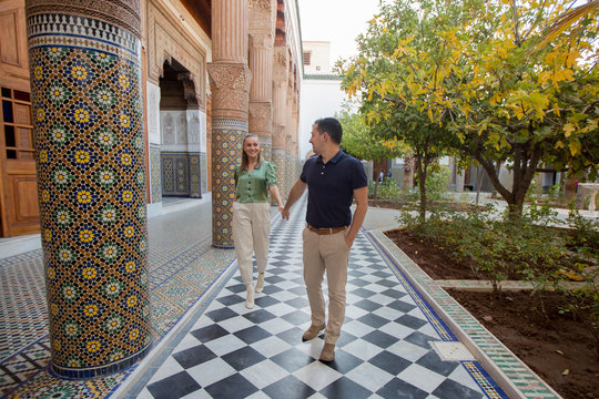 Happy Couple Posing In Morocco Palace Garden