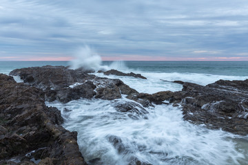 waves breaking on the rocks