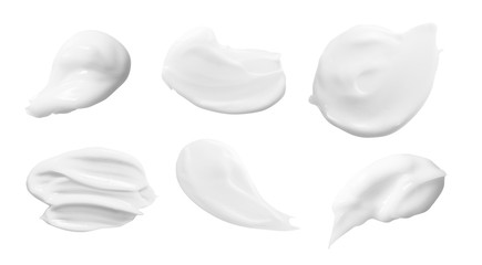 White beauty cream, lotion smears set. Cosmetic creme swatches isolated on white background. Skin...