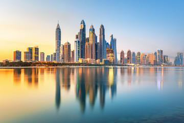 Obraz na płótnie Canvas Dubai Marina and famous Jumeirah beach at sunrise, United Arab Emirates