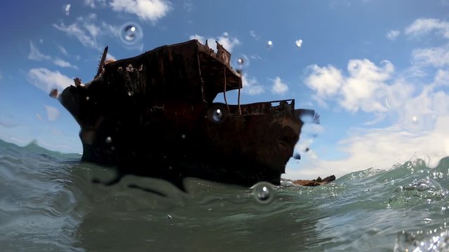 Shipwreck of the Meisho Maru small Japanese fishing vessel at Cape Agulhas southernmost tip of Africa, Low water surface shot