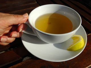 Cup of tea in the hand