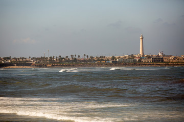 Fototapeta premium Beautiful view upon city from sea, whote harbor near beach