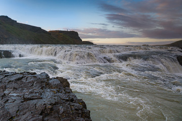 Iceland, Gullfoss waterfall. Captivating scene with rainbow of Gullfoss waterfall that is most powerful waterfall in Iceland and Europe. Picturesque summer scene with amazing Icelandic waterfall.