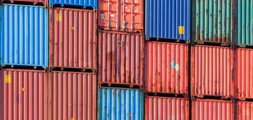 Stacked cargo containers background photo