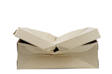 Damaged cardboard box isolated on white